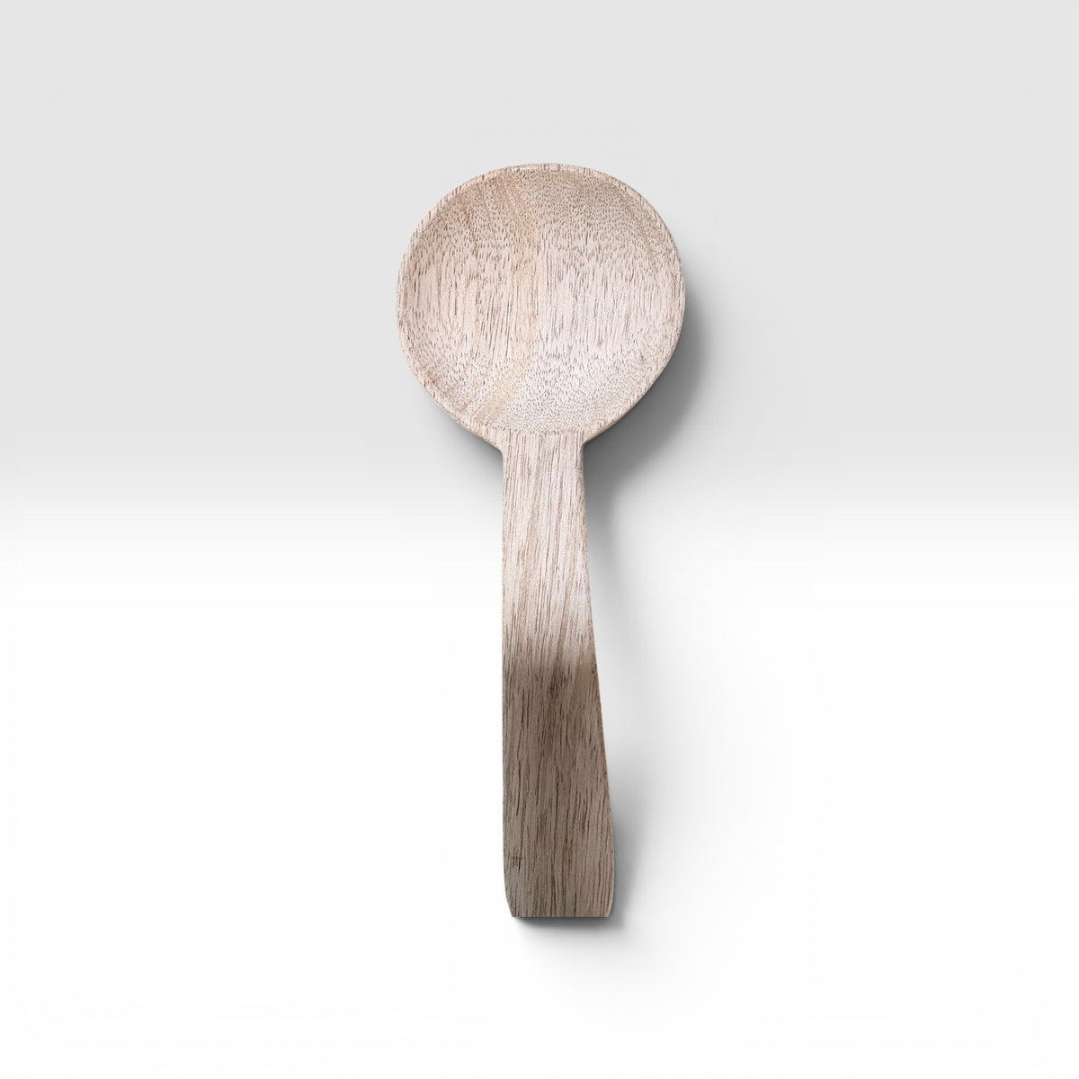A Hand-Carved Mango Wood Spoon