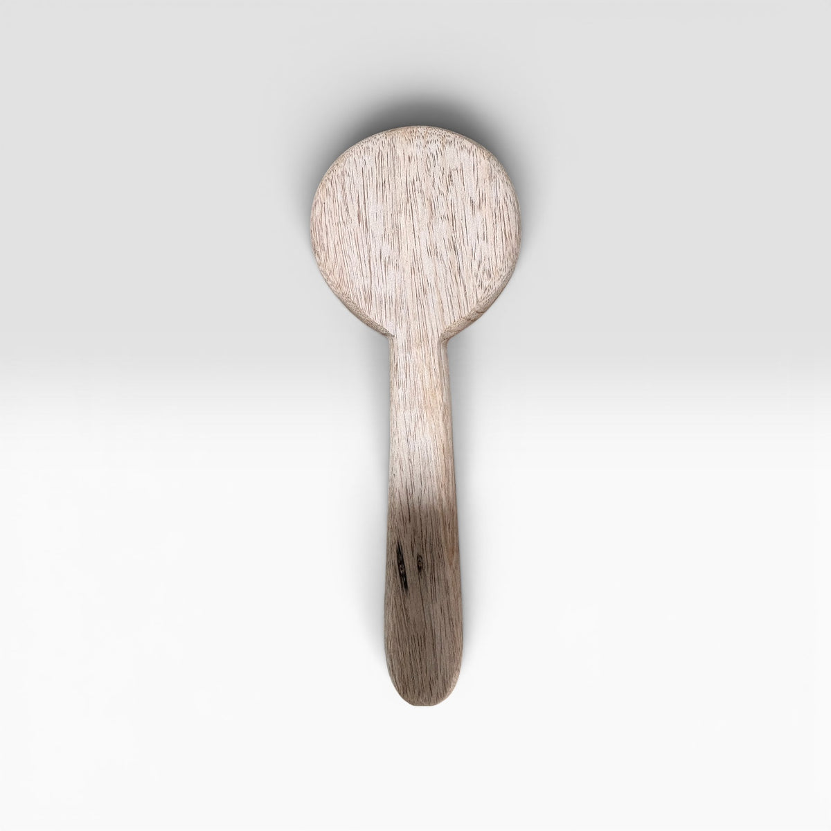 A Hand-Carved Mango Wood Spoon