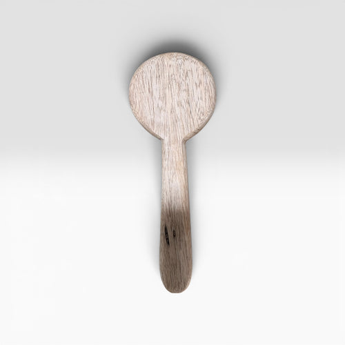 A Hand-Carved Mango Wood Spoon