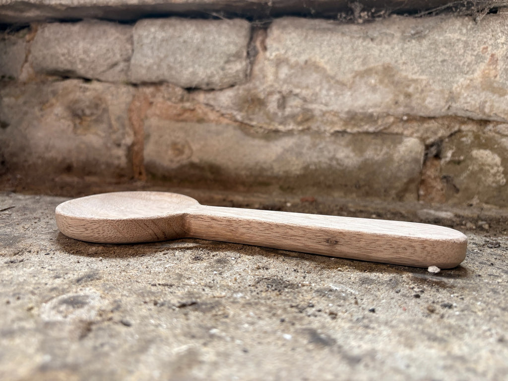 A Hand-Carved Mango Wood Spoon