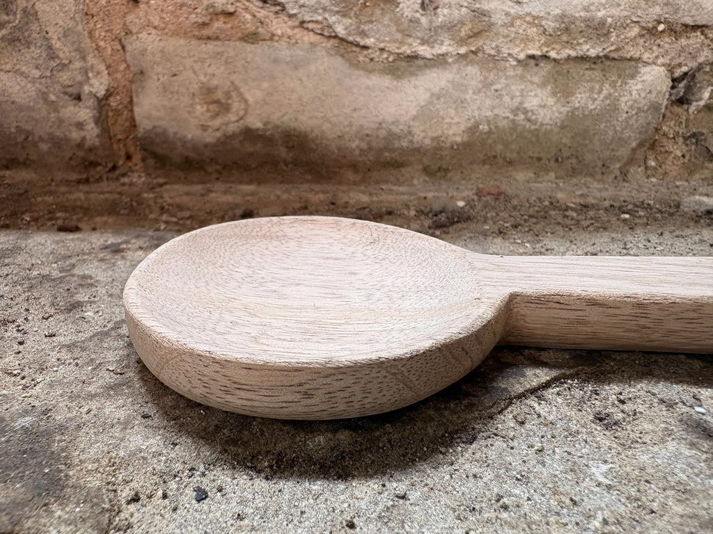 A Hand-Carved Mango Wood Spoon