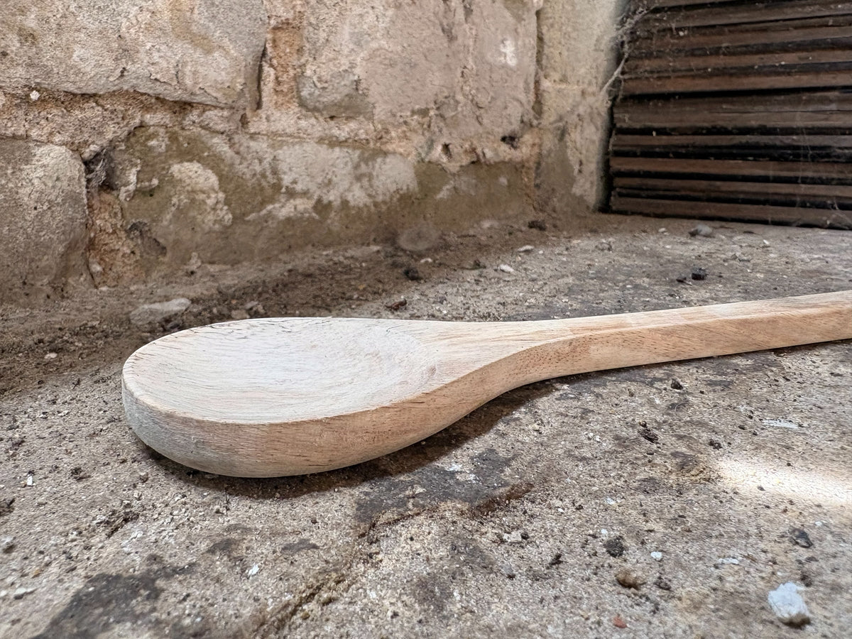 A Hand-Carved Mango Wood Serving Spoon
