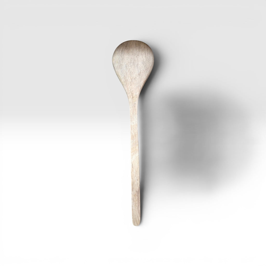 A Hand-Carved Mango Wood Serving Spoon