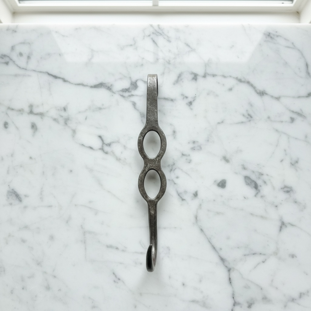 A Set of Three Vintage Butcher’s Hooks